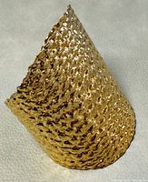 Angled front view showing overall shape and hammer-textured finish