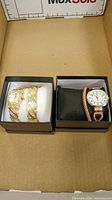 Two sets of ladies watches with matching bracelets in box, gold-tone and rose gold-tone