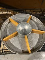 Top-down view of the galvanized metal and wood chip and dip tray showing wooden dividers and central metal dip bowl.