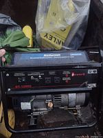 Front view of Mastercraft GT-1200C gas-powered portable generator showing control panel, outlets, and PowerG branding.