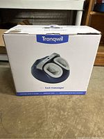 Front view of the Tranquil M1 foot massager box showing the product image and brand name.