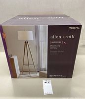 Box of Allen & Roth Amesbury floor lamp showing front and side packaging with product image and specifications.