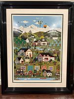 Framed serigraph showing full artwork, double mat and black frame