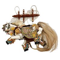 Horse puppet with painted wood body, colorful fabric gear, natural hair tail and mane, and wooden control bar with strings shown from side angle.