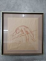 Full front view of framed sketch, showing figure and frame condition