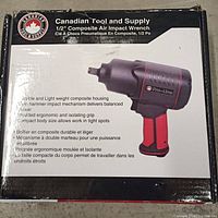 Box of Canadian Tool and Supply 1/2" Composite Air Impact Wrench with product details on side indicating features like composite housing and twin hammer impact.