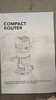 Instruction manual cover showing Compact Router title