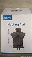 Photo of closed retail box showing product image and model number HA-H222D, brand Renpho Heating Pad