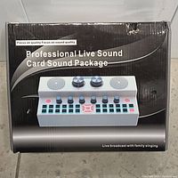 Box of professional live sound card sound package showing product image and branding.