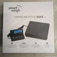 Front of the retail box showing the Smart Weigh brand and model ACE110 shipping and postal scale, with image of the scale and display and key features described.