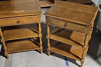 Two vintage wooden nightstands side by side showing front and partial side views, highlighting condition and design.