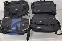 Six laptop shoulder bags, varied designs and colors black and blue, showing front and top views