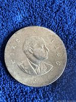 Obverse side of the 1966 Irish Ten Shillings silver coin showing the man's portrait, with the date and country name.