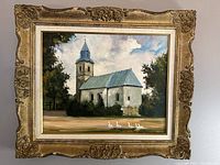 Full view of the framed oil painting showing church scene and geese