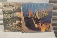 Photo of two Supertramp vinyl records side by side, showing cover art of both albums.