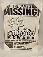 Front view of the framed promotional poster showing signed Juelz Santana image and text