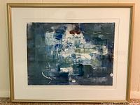 Framed monotype print showing the full artwork with cream matte and gold wood frame.