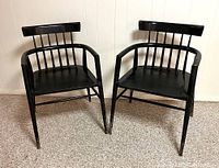 Pair of black bentwood armchairs front view
