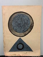 Full view of the entire lithograph showing the circular and triangular shapes, and the visible wear along the edges with some discoloration on the paper.