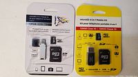 Photo showing two sealed MFlash microSD 4-in-1 Mobile Kits in original packaging, 64GB and 128GB capacities.
