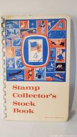 Front cover of the vintage Stamp Collector's Stock Book with patriotic U.S. stamp design
