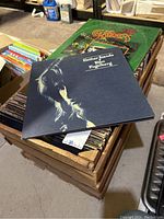 View of LP records box with Dan Fogelberg 'Nether Lands' album on top and The Crusaders 'Southern Comfort' behind.