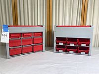 Front view of two grey IKEA storage units with multiple red bins, showing one unit with 10 bins and the other with 9 bins due to one bin missing.