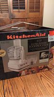 Original box of KitchenAid 11-cup Ultra Power food processor with product images and branding.