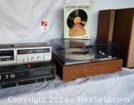 Wide view showing KLH record player, two KLH speakers, and Scotch Record-Vacuum in original box