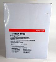 White box with Honeywell branding and product label showing model TG512A 1009 and product specs in multiple languages.