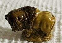 Close-up photo of the Wade buffalo figurine showing detailed fur texture and natural stance