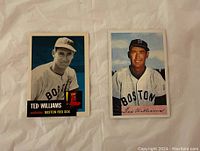 Front view of two Ted Williams baseball cards, one in black and white, the other in color, both showing Ted Williams in Boston Red Sox uniform.