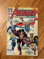 Front cover photo showing Avengers #300 comic book with Marvel superheroes including Captain America, Thor, and others.