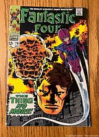 Front cover showing Fantastic Four #78 with prominent characters and title text.