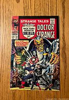 Front cover of Strange Tales #161 featuring Doctor Strange and Nick Fury with colorful vintage Marvel art.