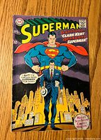 Front cover of Superman #201 comic book showing Superman and Clark Kent with cityscape background.