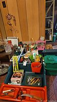 Plastic gardening trays and assorted gardening tools, pots, various small items