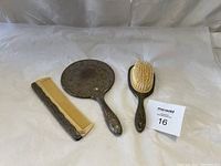 3-piece silver-plated vanity set including hand mirror, hairbrush, and comb