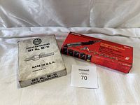 Mac Tools Screw Extractors Set No. SE-10 box next to Snap On Gas Soldering Attachment Multi Kit box.