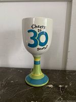 Front view of the glass showing colorful stem and 'Cheers to 30 Years!' text.
