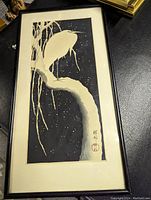 Frontal view of framed woodblock print showing the heron on a snow-covered branch against a starry night sky.