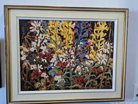 Front view of framed oil painting depicting wildflowers