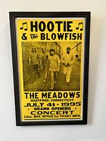 Front view of framed vintage Hootie & The Blowfish concert poster with clear text and image.