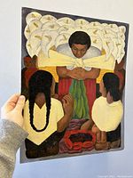 Front view of the oil painting showing the full artwork with three figures and large bouquet of white calla lilies, held by one central figure.