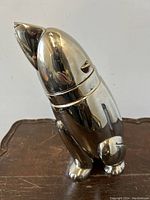 Side view of silver-plated polar bear cocktail shaker