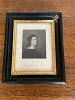 Photo of framed engraving portrait showing paper foxing and frame condition.