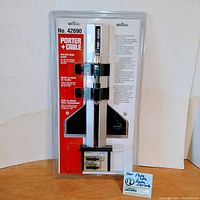 Full view of sealed Porter Cable Router Edge Guide No. 42690 in original plastic packaging with product visible.