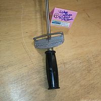 Close-up of the handle and torque measurement scale on the Craftsman torque wrench.