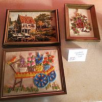 Overall image showing all three framed crochet artworks arranged on a surface.