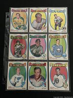 Front view showing nine hockey cards from the 1971-72 O-Pee-Chee NHL set featuring different players and teams.